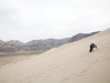 Ari climbing Eureka Dunes